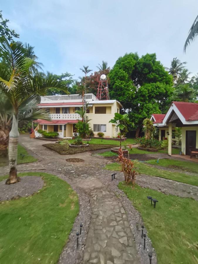 Puesta Del Sol Beach Bungalows And Restobar Мамбахао Экстерьер фото