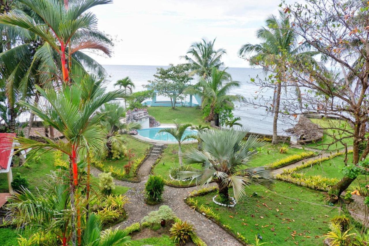 Puesta Del Sol Beach Bungalows And Restobar Мамбахао Экстерьер фото