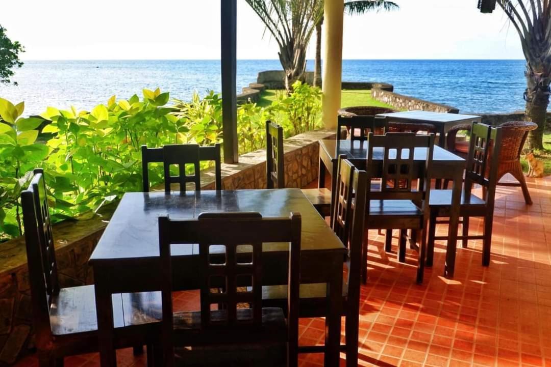 Puesta Del Sol Beach Bungalows And Restobar Мамбахао Экстерьер фото
