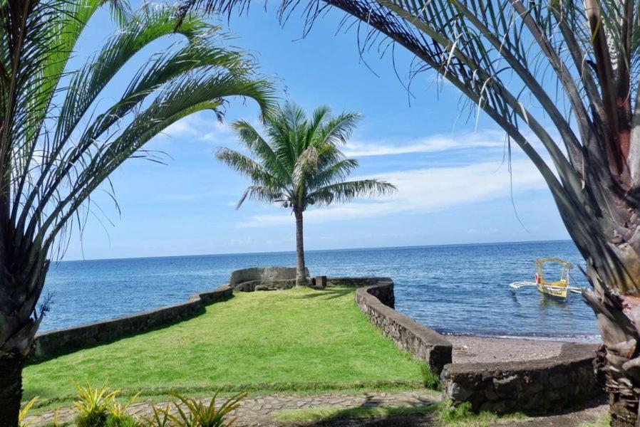 Puesta Del Sol Beach Bungalows And Restobar Мамбахао Экстерьер фото
